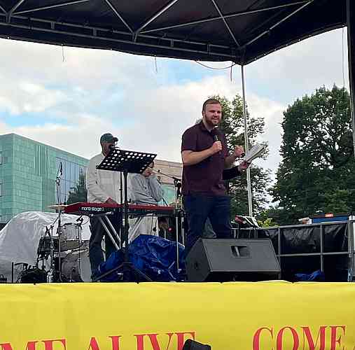 Matias Toivainen preaching