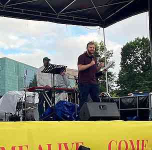 Matias Toivainen preaching